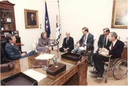 Lex Frieden and colleagues from NCD explain the concept of the Americans with Disabilites Act to Vice President Bush.