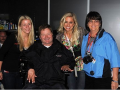 Cindy1 Cindy Norton, right, works with IndyCar team owner, Sam Schmidt, center, to organize “Day at the Races” events for his foundation.