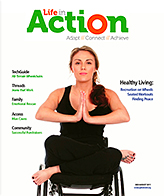 Life in Action cover July, August 2011. An image of young lady in a manual wheelchair. She is facing forward with her hands clasped in front of her in a classic yoga pose.