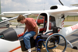Able Flight - Student accessing a craft from a wheelchair